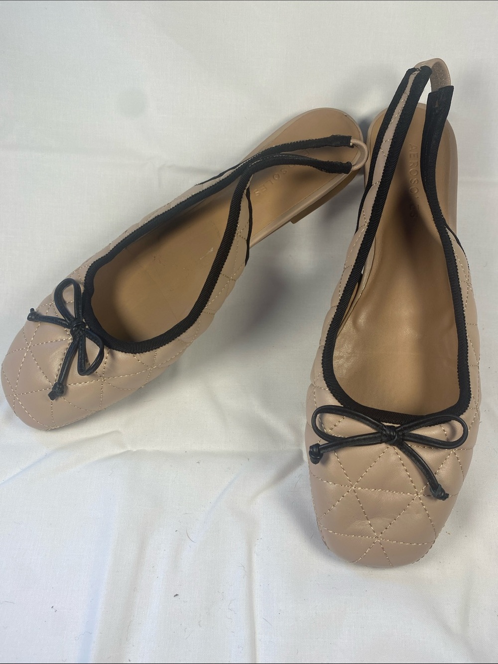 AEROSOLES Leather Quilted Nude Ballet Flats with Black Trim and Bow